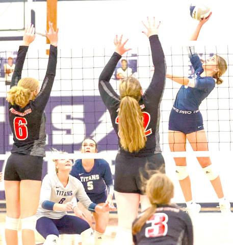HTRS’ Avery Dierberger (right) goes up for a tip over Pawnee City’s Madelyn Osborne (#6) and Riana McAhon (#22) while P.C.’s Kaylee Turnbull (#3); HTRS’ Jaylie McNealy (#8) and Lillian Bowen (#5) look on. Photo courtesy of Lorrie Novak