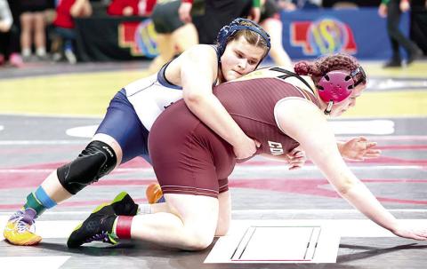 Photo courtesy of Lorrie Novak HTRS’ Ava Grimes (on top) at the start of the 2nd period in her Consolation match against Allee Jo Inzauro of Conestoga. Ava pinned her in 2:52.