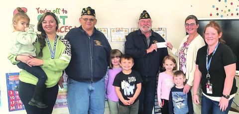 $500 dollar donation from the Table Rock American Legion to the Headstart Program for them to buy toys for the kids. With Jerry Vrtiska and Gregg Clement.