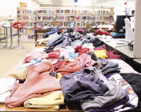 Library Hosts Free Clothing Giveaway and Henna Artist