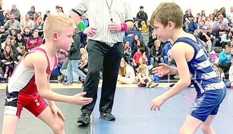 They recently hosted their tournament with 226 wrestlers in attendance. Pictured right is HTRS’ Talon Wamsley (right) in one of his matches. He took 1st place in one of the the 1st2nd grade divisions. See below for all of the details.