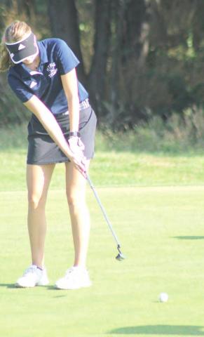 HTRS’ Gracie Shafer watches her putt roll towards the hole at the HTRS Invitational on Monday morning. Paula Jasa/Republican