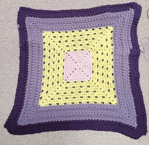 Your blanket should look similar to this by the end of this section. I ran out of one purple and had to switch part way through.