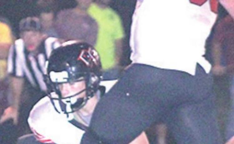 PC’s Simon Osborne kicks the PAT in the 1st quarter to make it 8-14. Paula Jasa/Republican