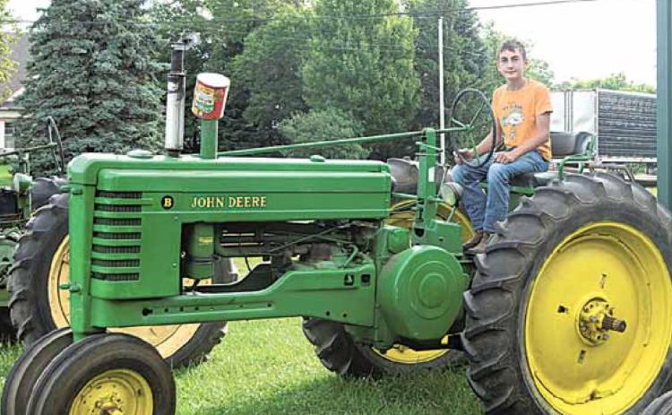 Norman McHenry and his 1952 John Deere B tractor. He won a People’s Choice Award at Harvest Bash one year. He got a trophy that was bigger than he was. He was just a little kid then. Ray Kappel/Republican