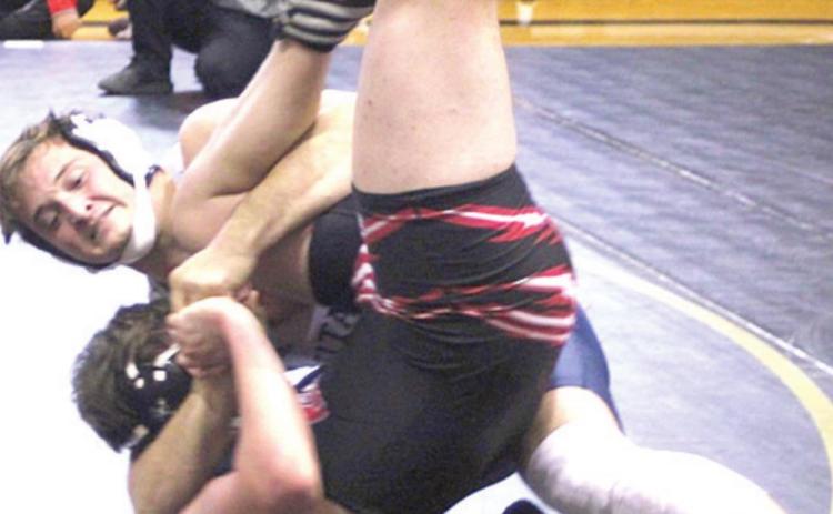 HTRS/P.C.’s Brandt Leech takes down his opponent at the JCC Invitational on Saturday.