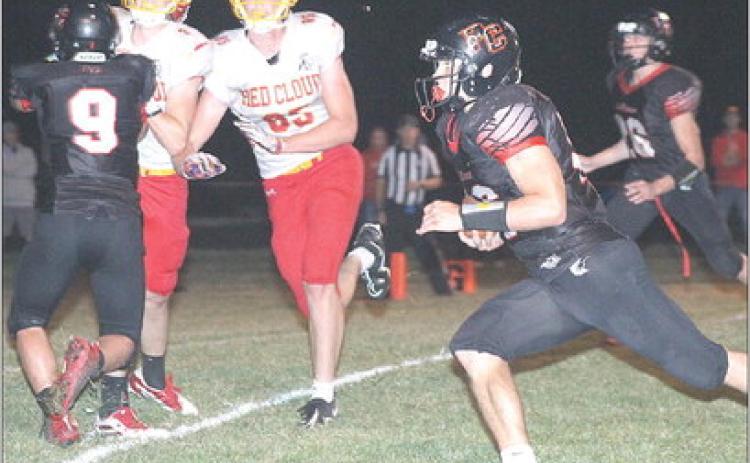 P.C’s Anthony Kling (right) heads to the end zone on one of his three trips there against Red Cloud. Kling had 18 carries for 139 yards and 3 TD’s against R.C. Paula Jasa/Republican