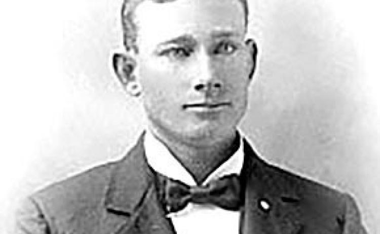 Lou Booth, Frank’s adoptive father, 6 years before