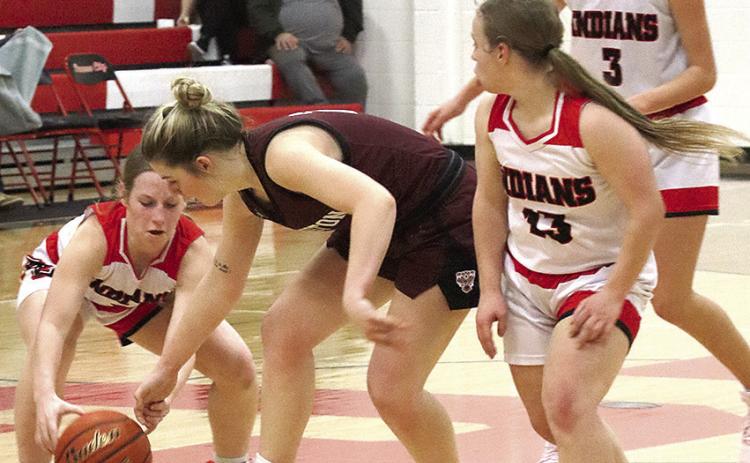 P.C.’s Cara Pierce (left) goes after the ball as LHS’ DeLanye Currie (center) brings down the ball against P.C.’s press. Also pictured are P.C.’s Ericca Gyhra (#13) and Kinsley Benson (#3). Paula Jasa/Republican
