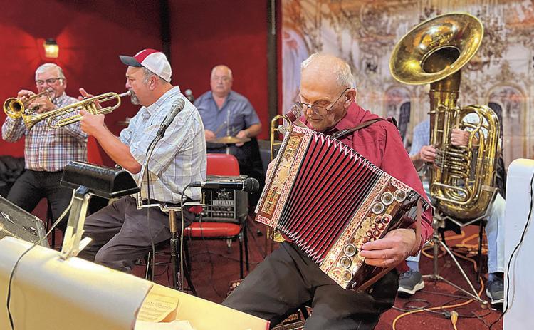 Bob on the button accordion during a dance in Table Rock.