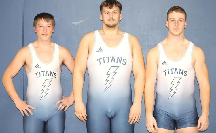 Members of the 2022-23 HTRS Wrestling Team are from left: Jesse McLaughlin, Ty Faulks and Andy Maloley. Not pictured: Kaden Demers.