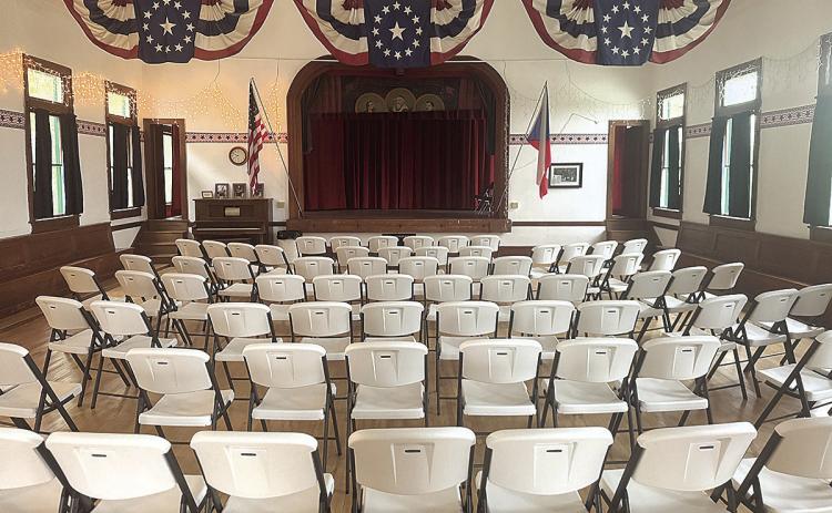 Chairs fill the dance floor at the DuBois ZCBJ Hall in anticipation of a program of classical music in Czech.