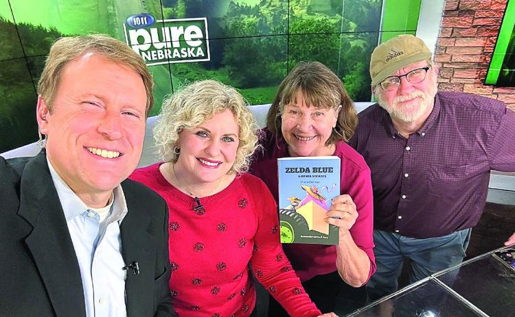 From Left:Jon and Taryn Vanderford, Sharla, and Jim Koudelka of Lincoln. Sharla Sitzman, Table Rock and Jim Koudelka, Lincoln spent a morning at the Pure Nebraska studios in connection with their volunteer work with the UNL Friends of Opera. “Show your book!” Jim said, and Jon quipped, “We’ll have to do a segment about it!”