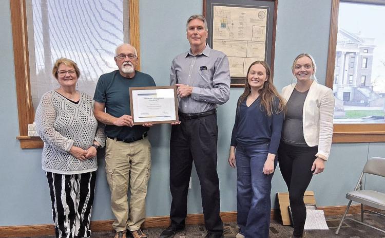 From left to right: City Clerk Tammy Curtis, Mayor Charlie Hatfield, Dave Honz, Economic Development Co Directors Josie Friedly and Jess Colo