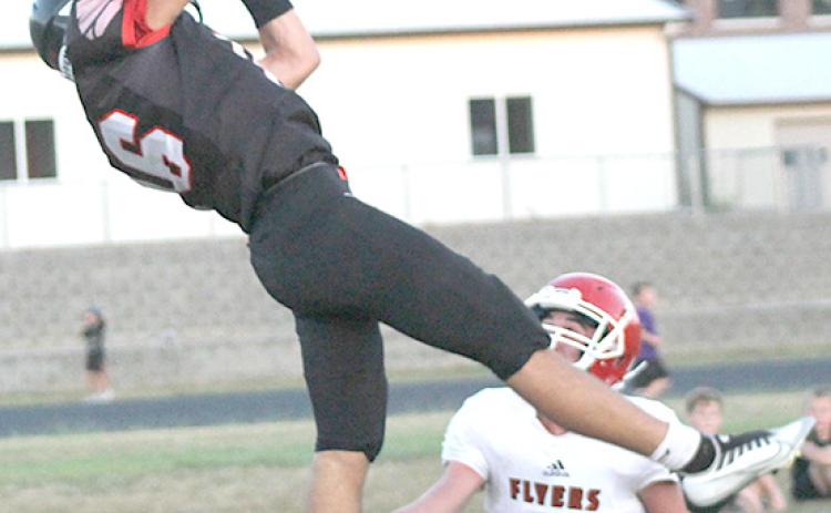 Pawnee City opened up the 2022 season with an easy 48-7 win over the Franklin Flyers on Thursday night. Anthony Kling (#16, left) made this awesome TD catch right before halftime and then kicked the PAT to put P.C. up 32-0. See page 5-6 for all of the details.