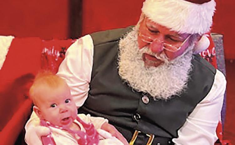Elise Tyler visits Santa for her first Christmas