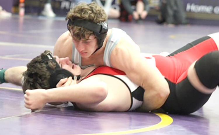 HTRS/P.C.’s Andy Maloley pins his opponent at the Louisville Wrestling Invitational last week. Andy won his 170 lb. division at the Tournament. photo courtesy of Shane Maloley