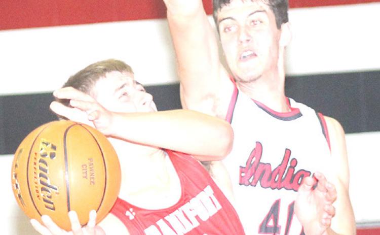 P.C.’s Oscar Machini (#40, right) goes up for a block against a Frankfort, Ks. player on Friday night. Paula Jasa/Republican