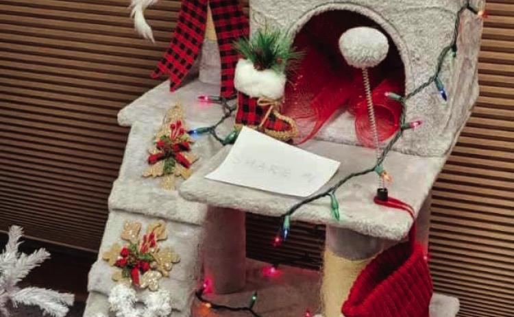 S.H.R.E. Animal Resue won sendond place in the Christmas Tree Lae contest with their decorates Cat Tree.