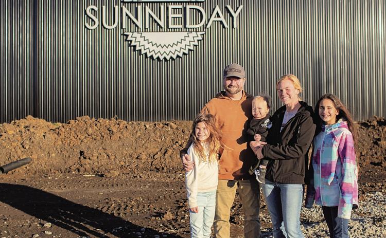 Mark Sunneberg decided he wanted to raise his childre in Pawnee City left to right are daughter Sicilia, Mark Sunneberg, Jr., son Lukas, Mark’s wife Brittany and daughter Sophia - photo by Courtney Kosiski
