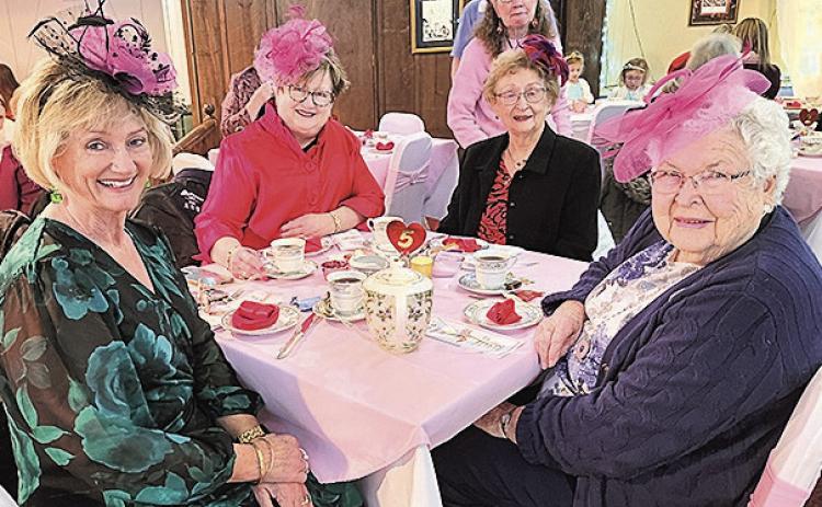 Wearing pink facinators are from let Michelle Tegtmeir, Carol Buzzard, Sherry Lovell and Esther Tegtmier.