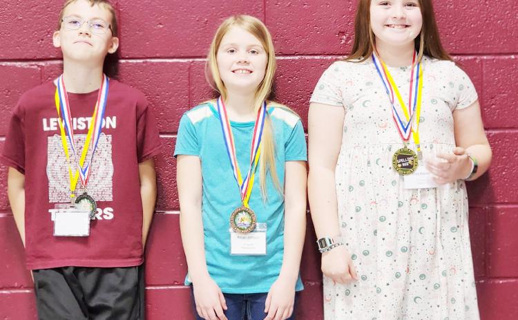 3rd/4th Grade Division: (l to r) Landon Rohmeyer, Lewiston, 2nd place, Abigail Johnson, Pawnee City, 3rd place, Chloe Bogues, Lewiston, 1st place