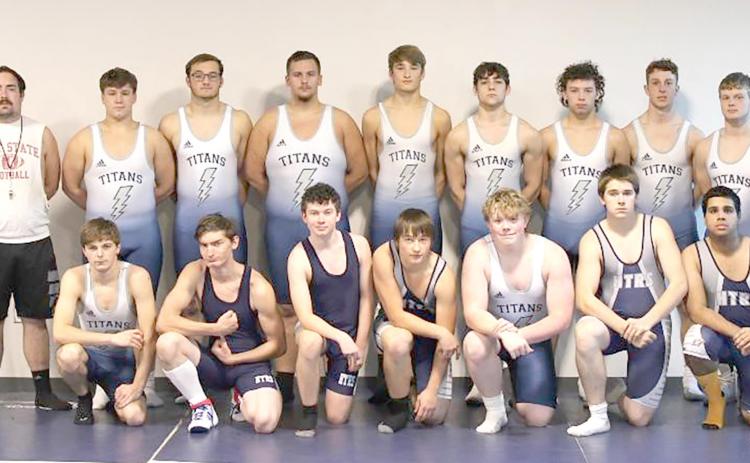 Members of the 2021-22 HTRS Wrestling Team are front, from left: Roman Coats, Caleb Werman, Isaac Thompson, Jesse McLaughlin, Clayton Howe, Zachary Hedden, Yadriel Cartagena. Back row: Ricky Long, s.m., Coach Koalton Taiclet, Aiden Worthey, Isaac Bittner, Ty Faulks, Brandt Leach, Devin Zermeno, Marcus Bratrsovsky, Andy Maloley, Clayton Shook, Coach Shane Maloley.
