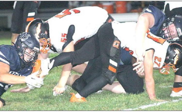 Titans hold on for tough Homecoming win over Griffins