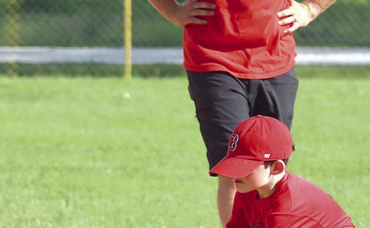 photos by Paula Jasa/Formerly of The Republican/and Trevor Jasa My next photo assignments are going to be of my grandchildren including Walker Jasa (above, inset) and Landon Jasa (above, right) forming their early athletic careers under the tutelage of my son Trevor (above, center). This will coincide with my future fishing endeavors (pictured below) on the family boat at Burchard Lake or on trips to Boston, the golf course, etc. with hubby, Bill!