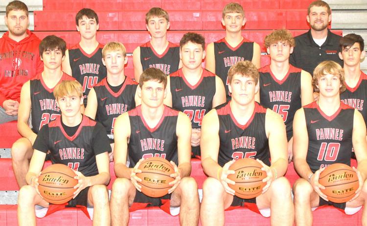 Members of the 2021-22 Pawnee City Boys’ Basketball team are front, from left: Kylenn Koester, Bryce Gyhra, Simon Osborne, and Kyle Gyhra. Second row: Anthony Kling, Justin Pierce, Joseph Marteney, Gavin Baker, and Philip Layne. Third row: Asst. Coach Mason Amundson, Jett Farwell, Drew Menninga, Garrison Bowhay and Head Coach Hadley Sejkora. Not pictured: Brysen Horst.