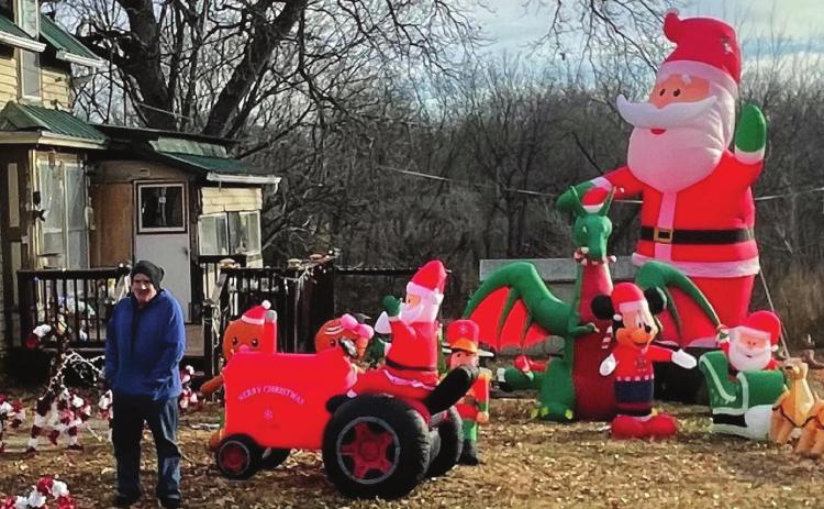 Chuck Habegger showing off his locally famous Christmas decorations Ray Kappel/Pawnee Republican