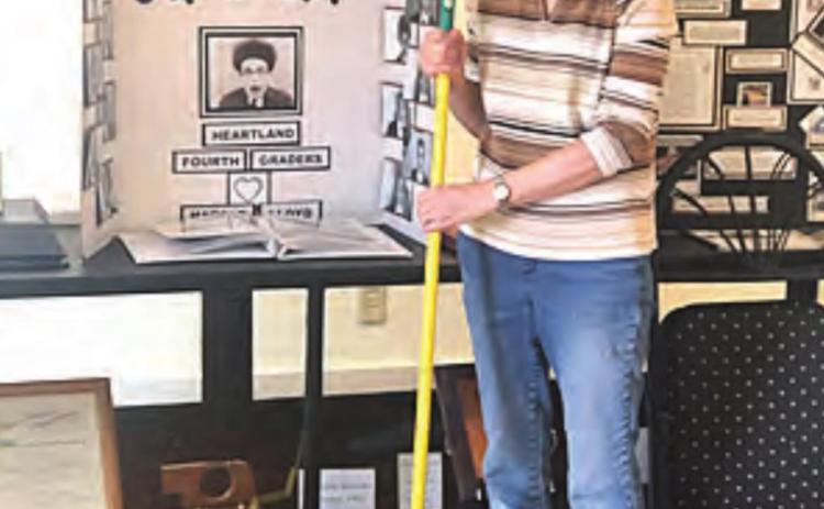 Marica Borcher cleaning at the Harold Lloyd Museum.