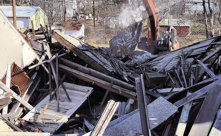 Inline Construction has begun demolition and cleanup of the collapsed buildings on G Street