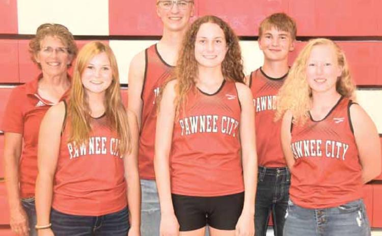 Members of the 2020 Pawnee City Cross Country team are front, from left: Olivia Gottula, Emily Lytle, Allyssa Pierce. Back row: Coach Candace Sejkora, Kaleb