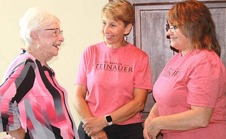 Cheryl Clement (left) takes time to visit with current owners Carol Schaardt (center) and Suzanne Borcher (right) during the Customer Appreciation Dinner.