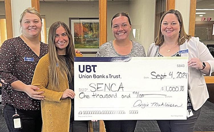 Union Bank &amp; Trust is proud to support local causes in the communities it serves. Recently, the bank made $1000 donation to Southeast Nebraska Community Action (SENCA). Pictured left to right: Katelynn Stephens, Cortney Johnson, both of Union Bank, Danyel Lewis of SENCA, and Carly Parrish of Union Bank.
