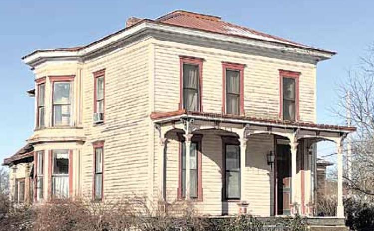 This house at 11th and G is owned by out of state people. It is one of 15 houses in town that are standing vacant. Ray Kappel/Republican