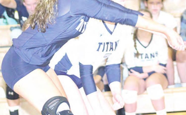 HTRS’ Ellie Schaardt passes the ball up to her setter in Tuesday’s game against Lewiston. Paula Jasa/Republican
