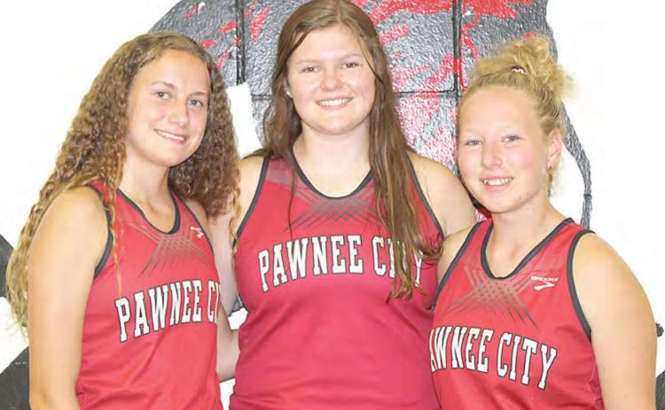 Members of the Pawnee City Cross Country team are from left: Emily Lytle, Kenadie Schmutz and Alyssa Pierce.