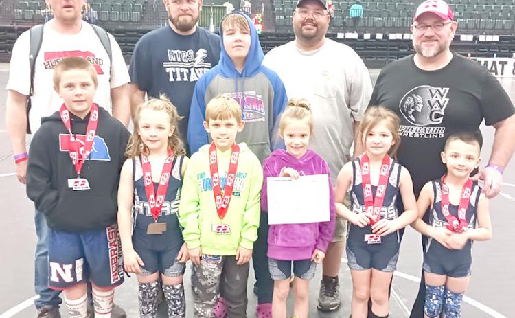 Pictured are front row, from left: Parker Schuetz, Mason Ellston, Gus Glathar, Everlynn Kreifel, Gemma Thompson, Laiken Ellston. Back row from left: Head Coach Jacob Schuetz, Trent Glathar, Gauge Schuetz, Cole Ellston, Coach Cory Thompson.