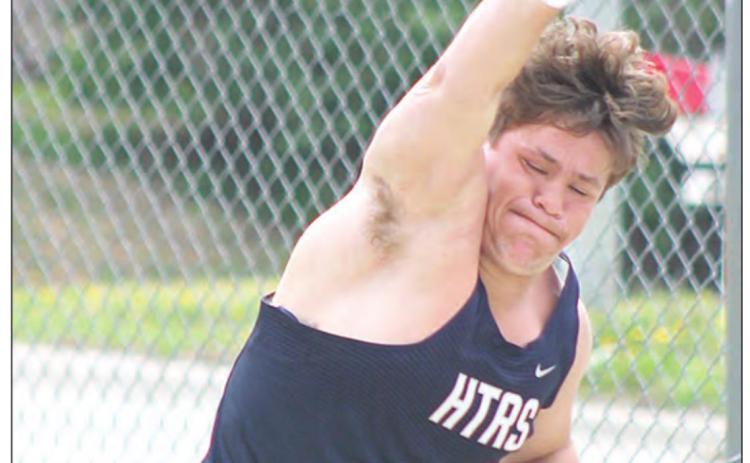 Paula Jasa/Republican HTRS’ Aiden Worthey launches a throw in the boys’ Shot Put. Worthey placed 4th with a toss of 37’2 1/4”.