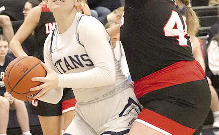 HTRS’ Elie Bstandig (left) goes up for a shot on the baseline against P.C.’s Addy Sisco (#44, right). Paula Jasa/Republican