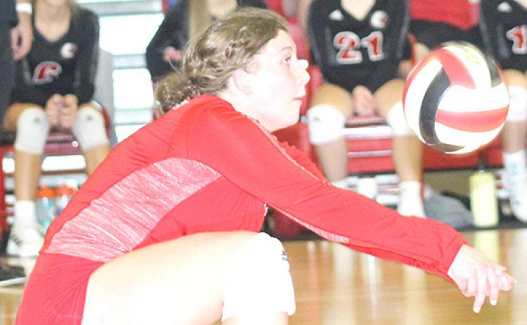 Paula Jasa/Republican P.C.’s Cameron Ottersberg digs a ball in Pawnee City’s Parent’s Night game against JCC last Thursday.