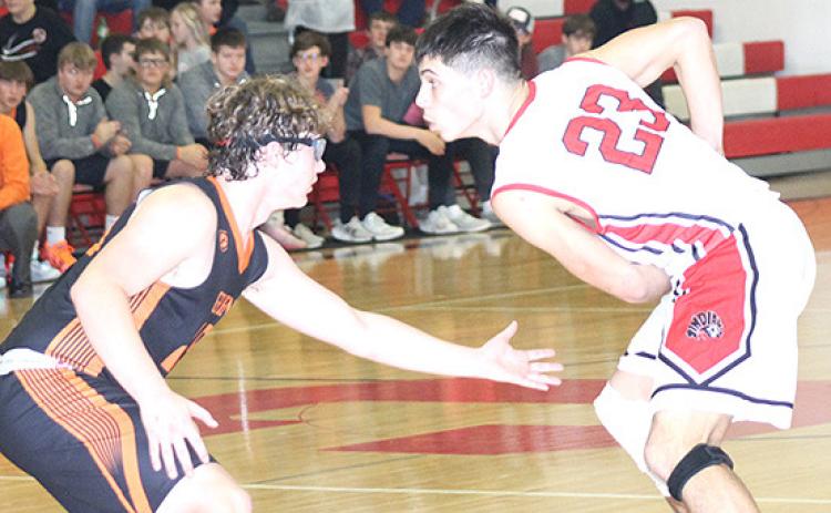 P.C.’s Anthony Kling (#23, right) gets ready to drive the paint against Diller/Odell in Thursday night’s game. Paula Jasa/Republican