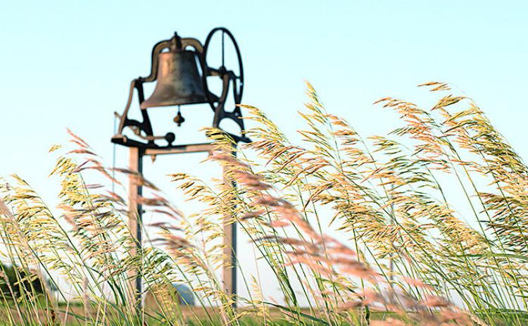 A Lonely Bell on a Country Road