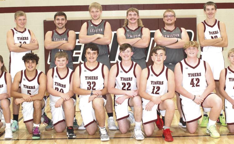 Members of the 2023-24 Lewiston Boys’ Basketball Team are front, from left: Cashton Steinacher, Alex Seeman, Taven Borcher, Axel Seeman, Cooper Swendener, Tristan Wagner, Brody Wright, Evan Christen. Back row: Everett Bohling, Brady Bledsaw, Caleb Rule, Tristen Ray, Jaxon Janssen, Ashton Sanders. Not pictured: Head Coach Kyle Asche and Asst. Coach Treyton Hippen.