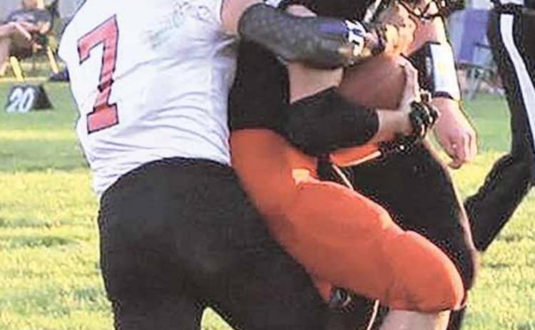 P.C.’s Jacob Lytle (#7) makes a stop against a Dorchester player in Friday’s game. photo courtesy of Heather Lytle