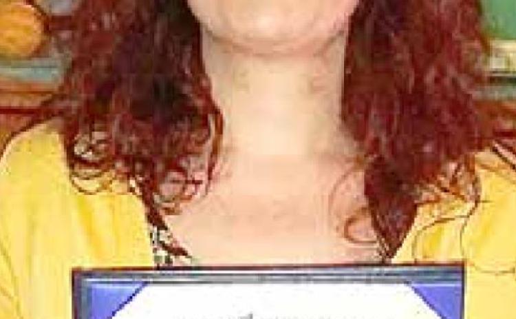 Tina Moore gets degree for her job as hospital head cook