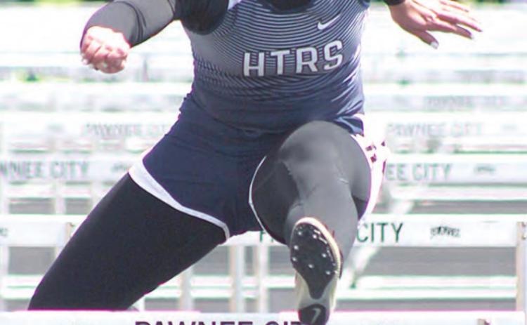 HTRS’ Natalie Novak clears her final hurdles of the 100 M. event and places 2nd at 17.94. Paula Jasa/Republican