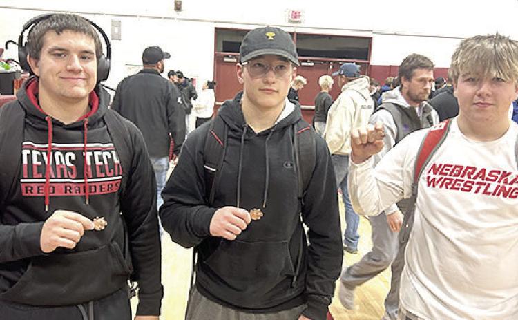 Pictured are Pawnee City wrestlers who claimed 3rd place medals in their respective divisions at the Conestoga Classic on Saturday. From left are: Dylan Layne, Jesse McLaughlin and Gauge Shuetz. Photo courtesy of Jamie Maloley